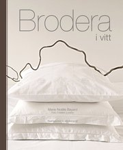 Brodera i vitt (kartonnage)