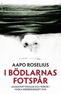 I b�dlarnas fotsp�r : massavr�ttningar och terror i finska inb�rdeskriget 1918 (inbunden)