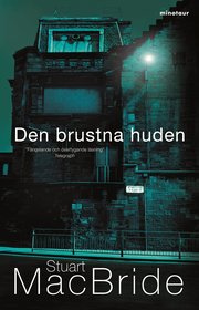 Den brustna huden (inbunden)