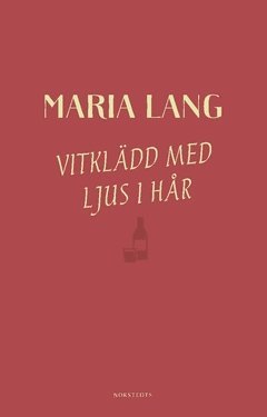 Vitkl�dd med ljus i h�r (h�ftad)