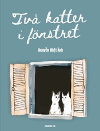Omslag för Två katter i fönstret