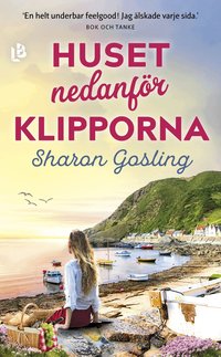 Omslag: Huset nedanför klipporna