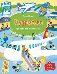 Omslag för Flygplatsen : pysselbok med klistermärken
