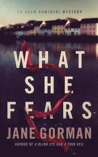 What She Fears: Book 4 in the Adam Kaminski Mystery Series