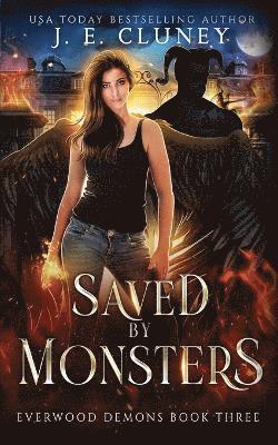 J E Cluney - Saved by Monsters, Häftad