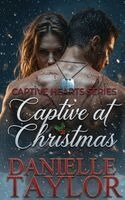 Danielle Taylor - Captive at Christmas, Häftad