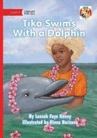 Tika Swims With a Dolphin