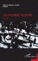Bekhtaoui Amine, Béatrice Mabilon-Bonfils - homme blessé, Häftad