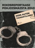 Mies auton tavaratilassa