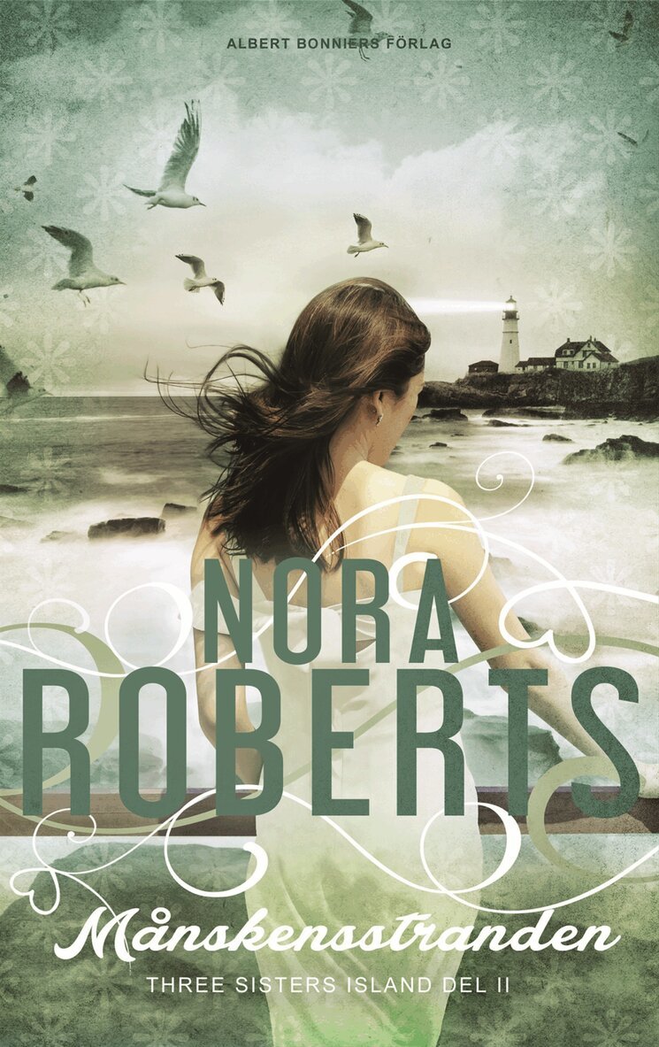 Nora Roberts - Månskensstranden, Inbunden