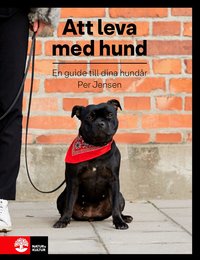 Att leva med hund : en guide till dina hund�r