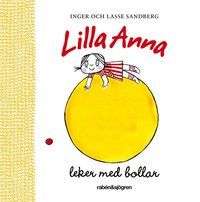 Lilla Anna leker med bollar