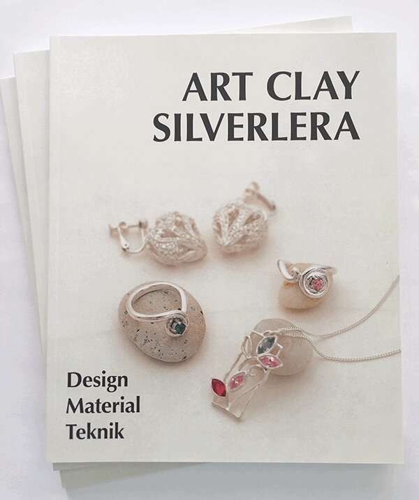 Art Clay Silverlera, Häftad