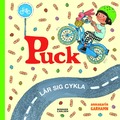 Puck lär sig cykla