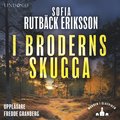 I broderns skugga